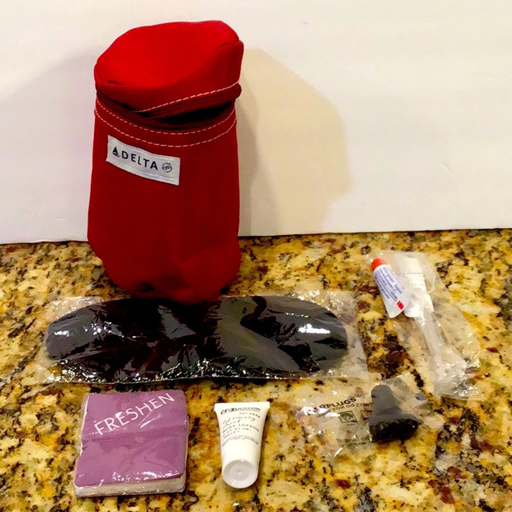Delta makeup or toiletries kit with produc…